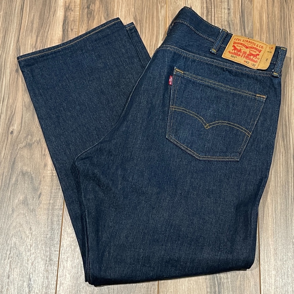 Levi's 501 Button Fly Jeans. 42 x 32 per tag. (see below)  Like new with flaw!